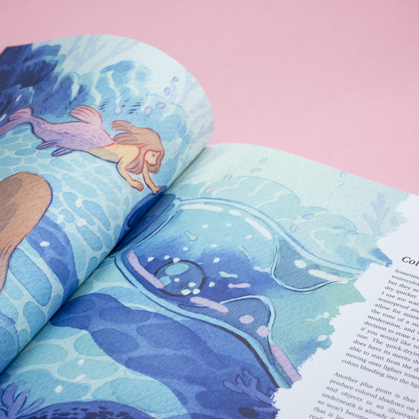 A closeup photo of a spread in The Art of Heikala art book, including images of ink illustrations.