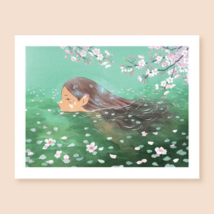 Print of a colored ink artwork depicting a pointy eared mermaid swimming across turquoise water. Above them several blooming cherryblossom branches reach over the water, and fallen petals and blossoms float all around them.